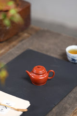 Small De Zhong crinkle-skinned vermilion clay Guangsu Mengchen-marked Yixing zisha pot