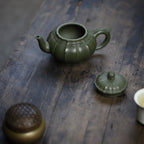 Tendril Laughing Sakura Yixing Zisha Pot handmade by artisans in original green clay