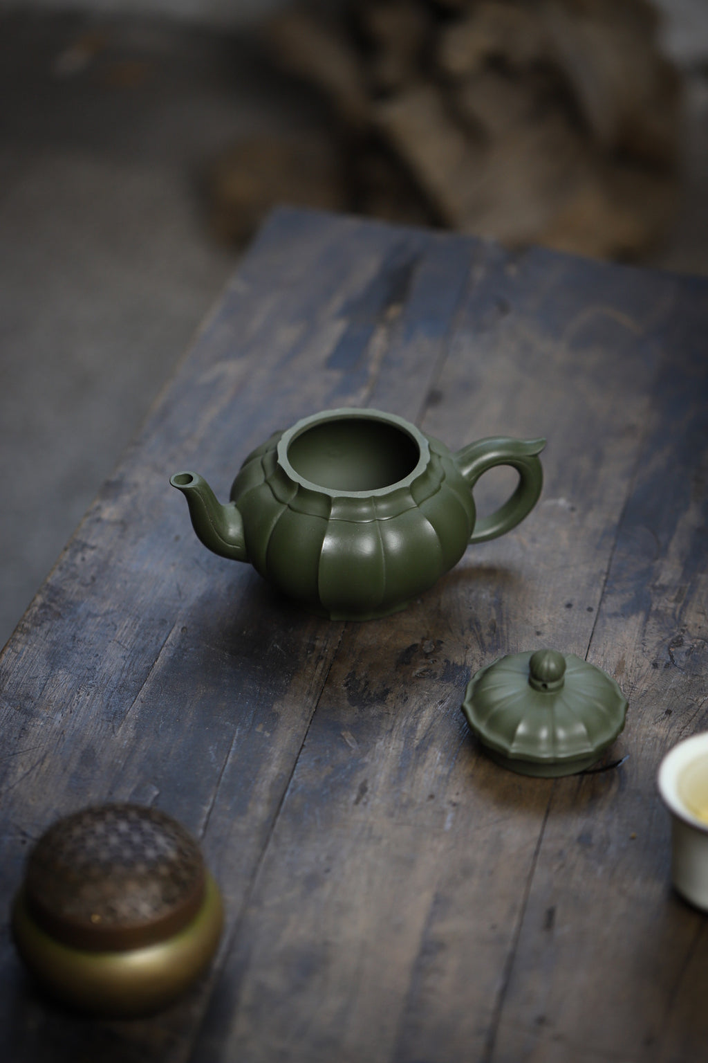 Tendril Laughing Sakura Yixing Zisha Pot handmade by artisans in original green clay