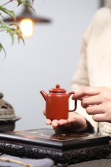 A small Kapu straight and wrinkled vermilion clay Yixing zisha pot with a Mengchen mark