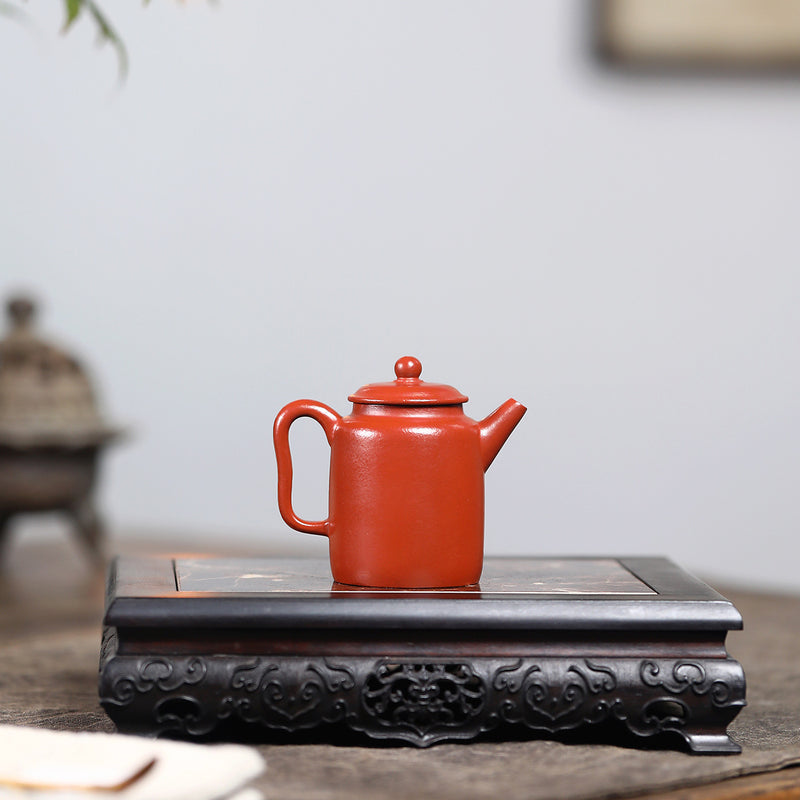 A small Kapu straight and wrinkled vermilion clay Yixing zisha pot with a Mengchen mark