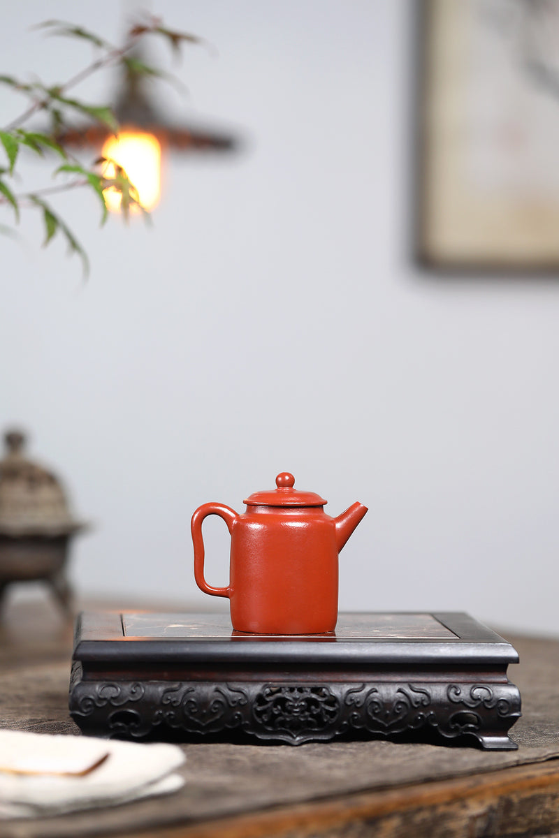 A small Kapu straight and wrinkled vermilion clay Yixing zisha pot with a Mengchen mark