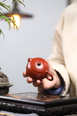 A small Xixi wrinkled skin vermilion clay Guangsu Mengchen-marked Yixing zisha pot