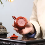 A small Xixi wrinkled skin vermilion clay Guangsu Mengchen-marked Yixing zisha pot