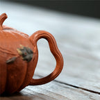 Yixing handmade purple clay pot wholesale bionic device downhill mud pumpkin 200ml