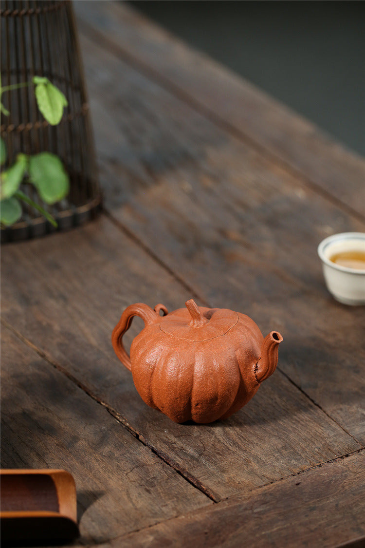 Yixing handmade purple clay pot wholesale bionic device downhill mud pumpkin 200ml