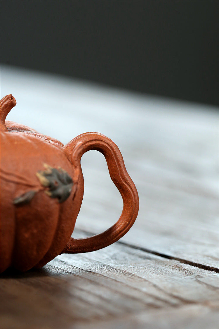 Yixing handmade purple clay pot wholesale bionic device downhill mud pumpkin 200ml