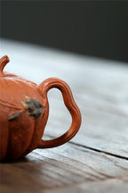 Yixing handmade purple clay pot wholesale bionic device downhill mud pumpkin 200ml