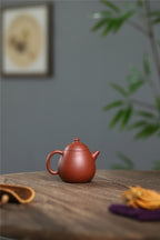 Yixing purple clay pot raw sand old vermilion mud handmade thin dragon egg 120ml