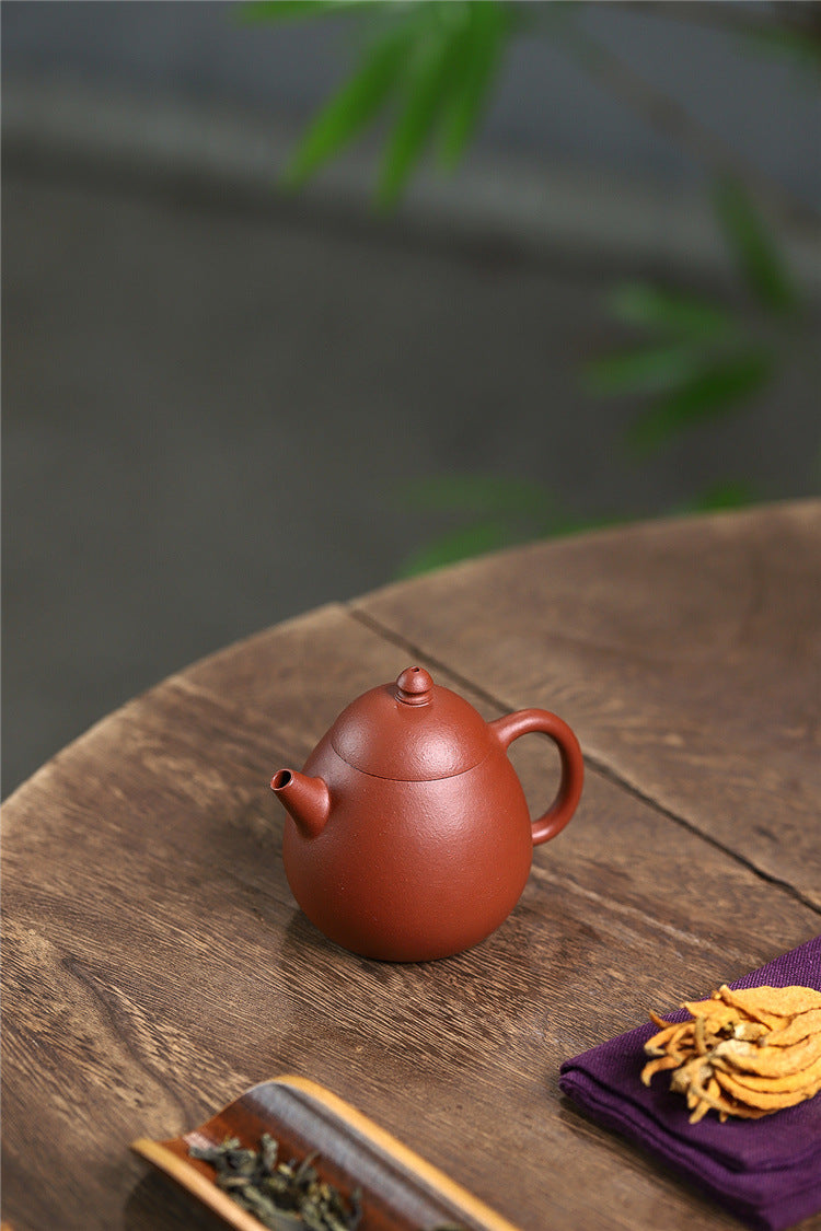 Yixing purple clay pot raw sand old vermilion mud handmade thin dragon egg 120ml