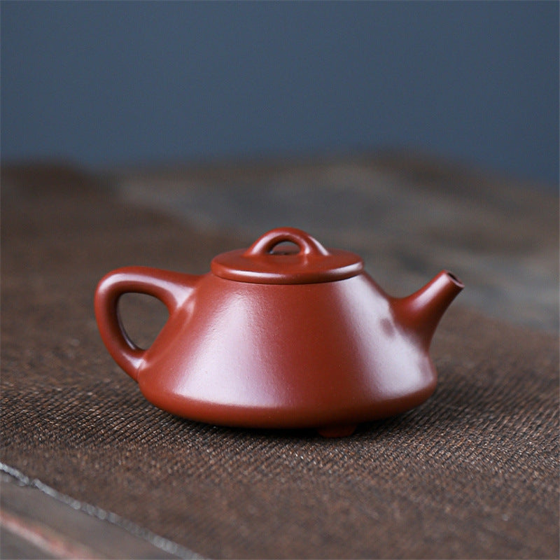 Yixing purple clay pot with vermilion dahongpao lettering stone scoop 220ml